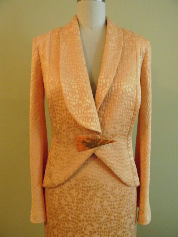 SALE was  280.00 now 250.00 Elegant  Suit, peach color, two pieces outfit, made out of satiny soft and slightly trapunto brocades,.