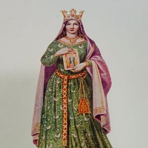 May include: A woman wearing a green and gold gown with a purple cloak and a crown. She is holding a small, framed image in her hands.