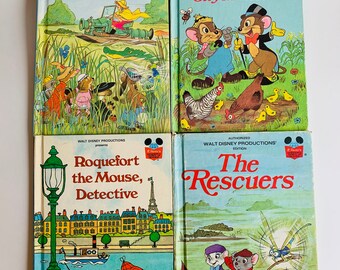 May include: Four vintage children's books featuring Disney characters. The Rescuers in Trouble in Devil's Bayou, Country Mouse, City Mouse, Roquefort the Mouse, Detective, and The Rescuers.