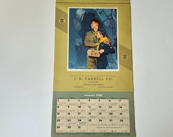 May include: A vintage 1950 Boy Scouts of America wall calendar featuring a Norman Rockwell illustration of a scout and a historical figure. The calendar includes the business name J. B. Farrell Co. Clothiers and Hatters from Augusta, Maine.