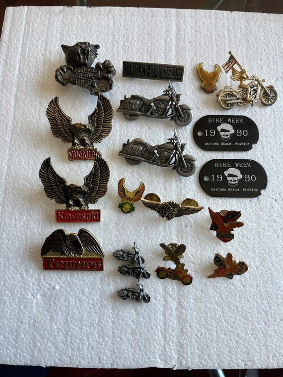 Lot of motorcycle pins , etc . 2 Harley