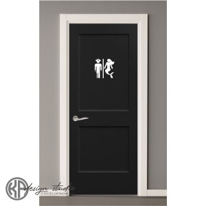 May include: A black door with a white sticker of a sailor and a mermaid on it. The sticker is a bathroom sign.
