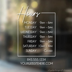 May include: White text on a black background with a white border shows the business hours for a store. The hours are listed for each day of the week, with the store being closed on Sunday. The phone number and website are also listed at the bottom.