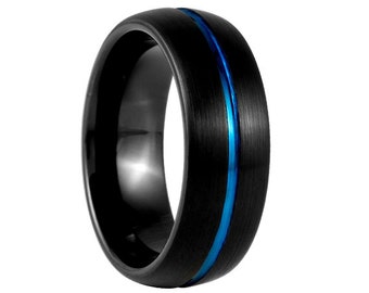 May include: A black ring with a brushed finish and a vibrant blue stripe down the center. The ring has a polished interior and a modern, minimalist design. This piece of jewelry is suitable for everyday wear.