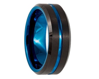 May include: A black tungsten carbide ring with a blue inlay. The ring has a beveled edge and a polished finish.