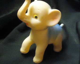 squeeze bulb jumping frog toy