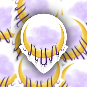 May include: A sticker featuring a crescent moon with a purple cloud behind it. The moon is outlined in gold and has purple, dangling, decorative accents.