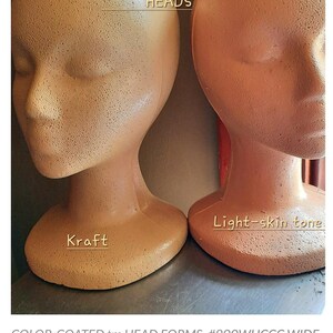 May include: Two color-coated female head forms. One is Kraft-colored, the other is light skin tone. The heads are 12" high and have a wide base. The text on the image says "POLLY PRODUCTS COLOR-COATED HEADS."