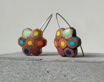 flower drop earrings handmade with recycled colouring pencils mounted on v shape sterling silver wires