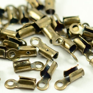 100 Pcs Antique Brass Round 9x3 mm Fold Over Crimp End , Ribbon End Crimp, Leather Cord End Finished  AB98