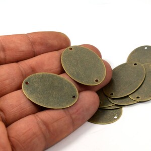 50 Pcs. Antique Brass 23x32 mm Oval 2 Hole Stamping Blanks Findings   AB264