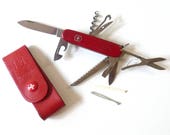 Victorinox Swiss Pocket Knife Multi tool folding knife with its leather belt Pouch