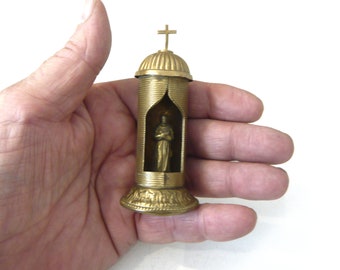 Miniature reliquary with mechanism Height 9 cm gilded brass Early 20th century Ancient religious amulet Catholic religion Liturgy Gospels