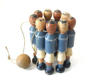 Antique wooden skittle pins 9 small wooden bowling pins dressed as footballers Wooden pins set Old Collectible toys 1930-1950s