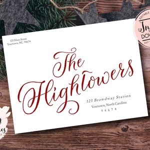 May include: White envelope with burgundy text reading "The Hightowers" and address details. Includes the text "Instant Download" and "Editable Template". The background is a wooden surface with festive decorations.