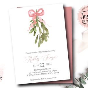 May include: Baby shower invitation featuring a watercolor mistletoe design with a pink bow and green leaves. The invitation includes event details: Ashley Sawyer, December 22nd, and the Magnolia Mannor address. The design includes the text "Instant Download".
