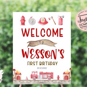 May include: A printable welcome sign for a first birthday party with a fire truck theme. The sign is white with red text and features a fire truck, fire hydrants, a fireman's hat, an axe, and a hose. The text reads "Welcome to Wesson's First Birthday 01.12.2022".