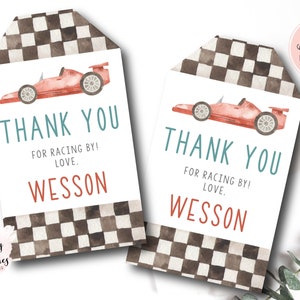 May include: Two racing-themed gift tags with a watercolor race car illustration. The tags feature the text "THANK YOU" and "FOR RACING BY! LOVE, WESSON". The top of the tags have a black and white checkered pattern.