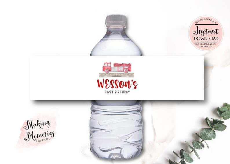 May include: Water bottle label with a red fire truck illustration and the text "Wesson's First Birthday". The label is white with a woodgrain background.