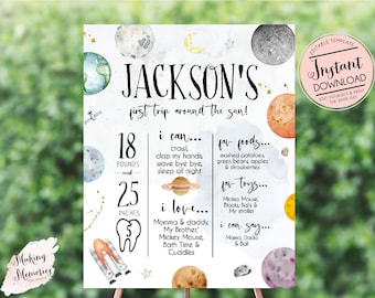 May include: A personalized sign for a child's first birthday, featuring the text "Jackson's first trip around the sun!" with details about the child's weight (18 pounds) and height (25 inches). The sign includes watercolor planets and stars.