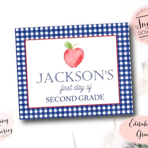 May include: Editable printable sign with a blue and white gingham background. The sign features a red apple with a green stem and the text "JACKSON'S first day of SECOND GRADE".