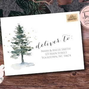 May include: White envelope with a watercolor Christmas tree design, gold stars, and the text "deliver to:" followed by an address. Includes a stamp and the text "Instant Download".