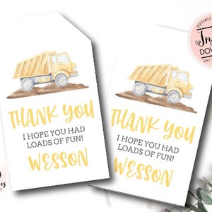 May include: Two yellow and brown thank you tags with a cartoon dump truck illustration. The text reads "Thank you. I hope you had loads of fun! Wesson".