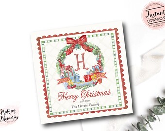 May include: Square Christmas gift tag with a watercolor wreath, red bow, and the letter "H". The tag reads "Merry Christmas" and "a gift from The Harris Family". The design includes gift boxes and a green and red border.
