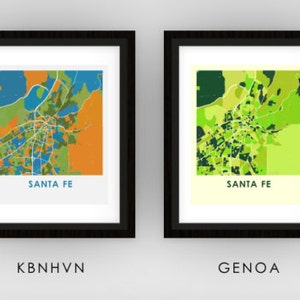 May include: Six framed prints of a colorful map of Santa Fe, New Mexico. Each print features a different color scheme, including Prussian blue, pomegranate red, green, yellow, red and yellow, and blue and purple.