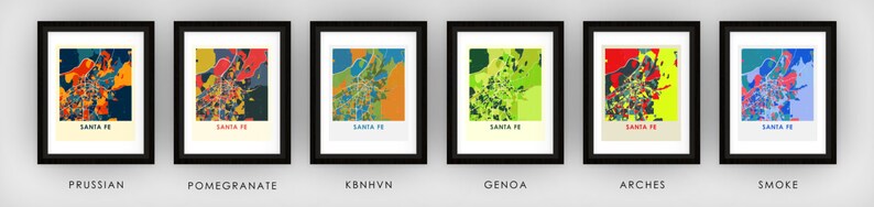 May include: Six framed prints of a colorful map of Santa Fe, New Mexico. Each print features a different color scheme, including Prussian blue, pomegranate red, green, yellow, red and yellow, and blue and purple.
