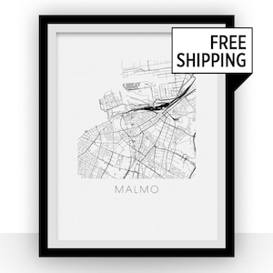 May include: A black and white line art map print of Malmo, Sweden. The map is framed in a black frame with a white mat.