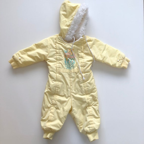 yellow snowsuit
