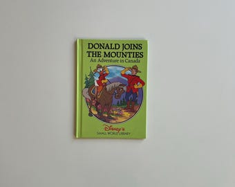 Vintage Walt Disney Travel Book Series Kids Donald Joins the Mounties an Adventure in Canada Childrens Book about Canada with Dinald Duck