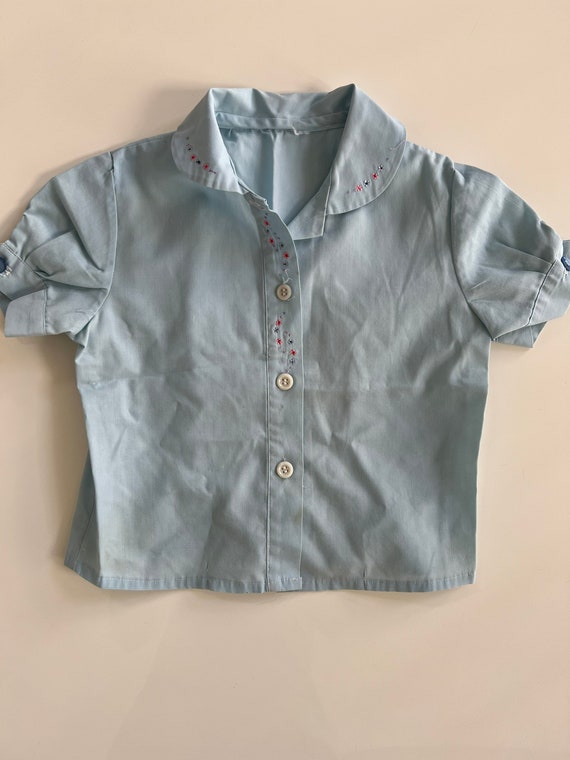 pale blue short sleeve blouse