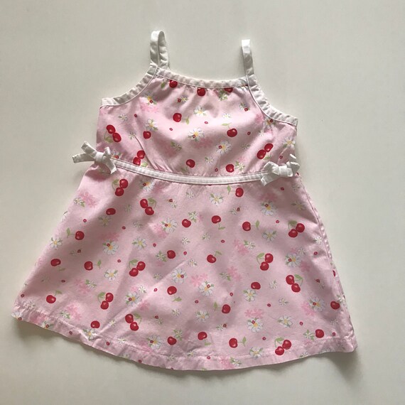 pink dress with cherries