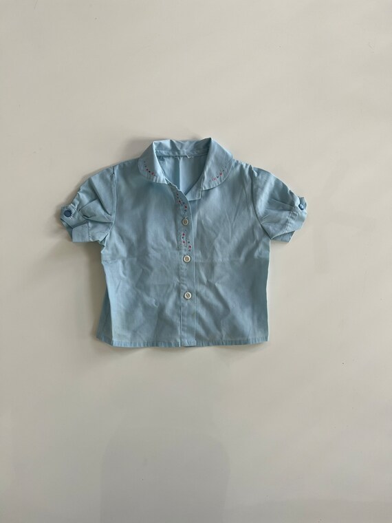 pale blue short sleeve blouse