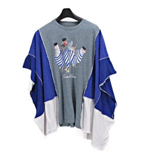 May include: A gray, blue, and white patchwork t-shirt with a hen graphic. The shirt features a crew neck and short sleeves. The hen graphic is embroidered with blue and white stripes and red accents. The text "Sunshine" is below the graphic.