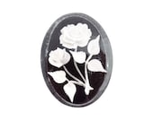 Reverse Carved And Painted Black and White Flower Lucite Brooch