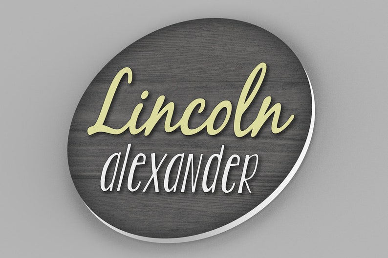 custom round name sign with wood background and first and middle name