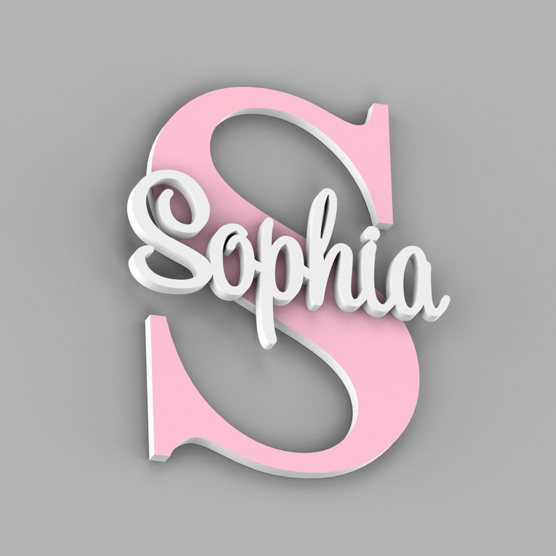Puede incluir: Letra S de madera rosa con el nombre Sophia escrito en letras blancas cursivas.