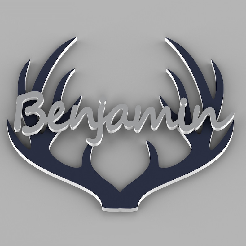 May include: A navy blue wooden antler design with the name "Benjamin" in silver lettering.