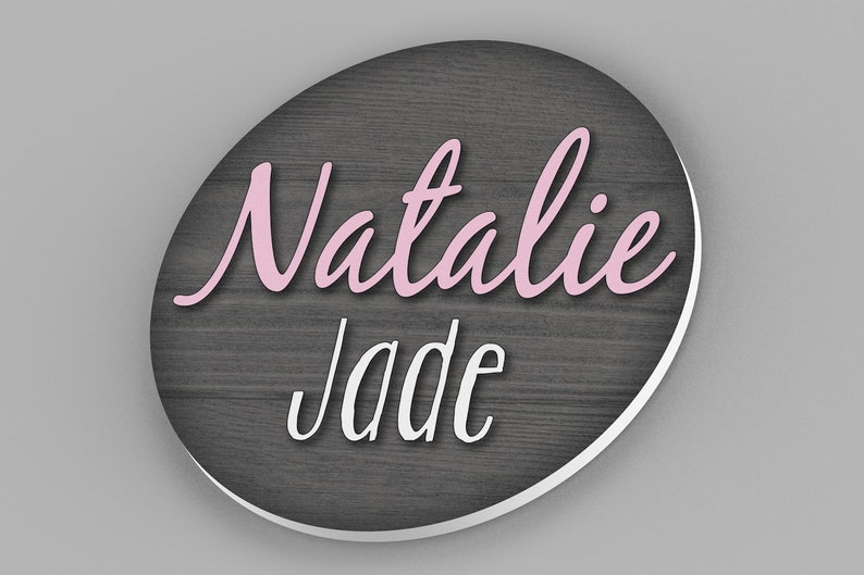 custom round name sign with wood background and first and middle name