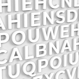 May include: A close-up shot of white 3D letters arranged in a grid pattern. The letters are of varying sizes and fonts, creating a visually interesting texture. The letters are against a light gray background.