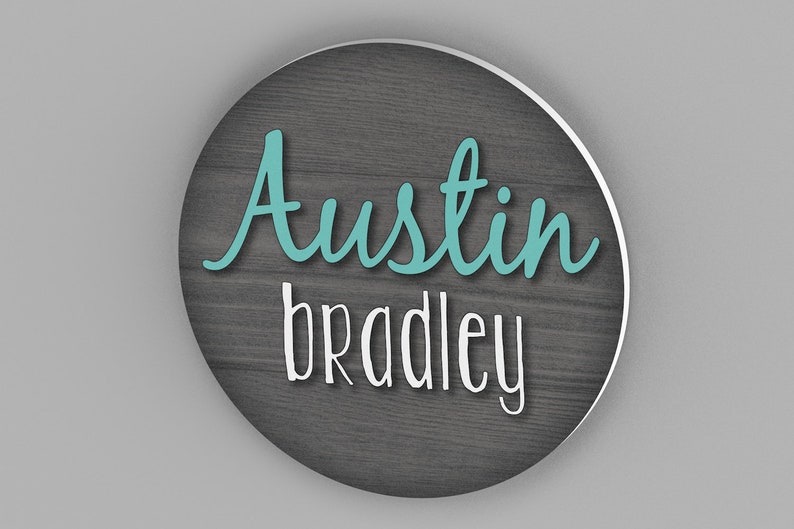 custom round name sign with wood background and first and middle name