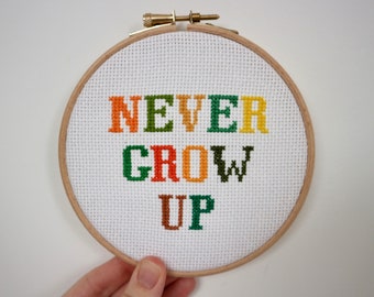 Never Grow Up Cross Stitch Kit | Beginners | Embroidery Thread | Hoop | Crossstitch | Peter Pan | Green & Orange | Children's Room