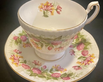 Rosina Queens footed cup and saucer in Wild Flower pattern, Circa 1960
