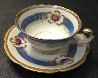 Vintage handpainted Japanese teacup and saucer - lots of gold!