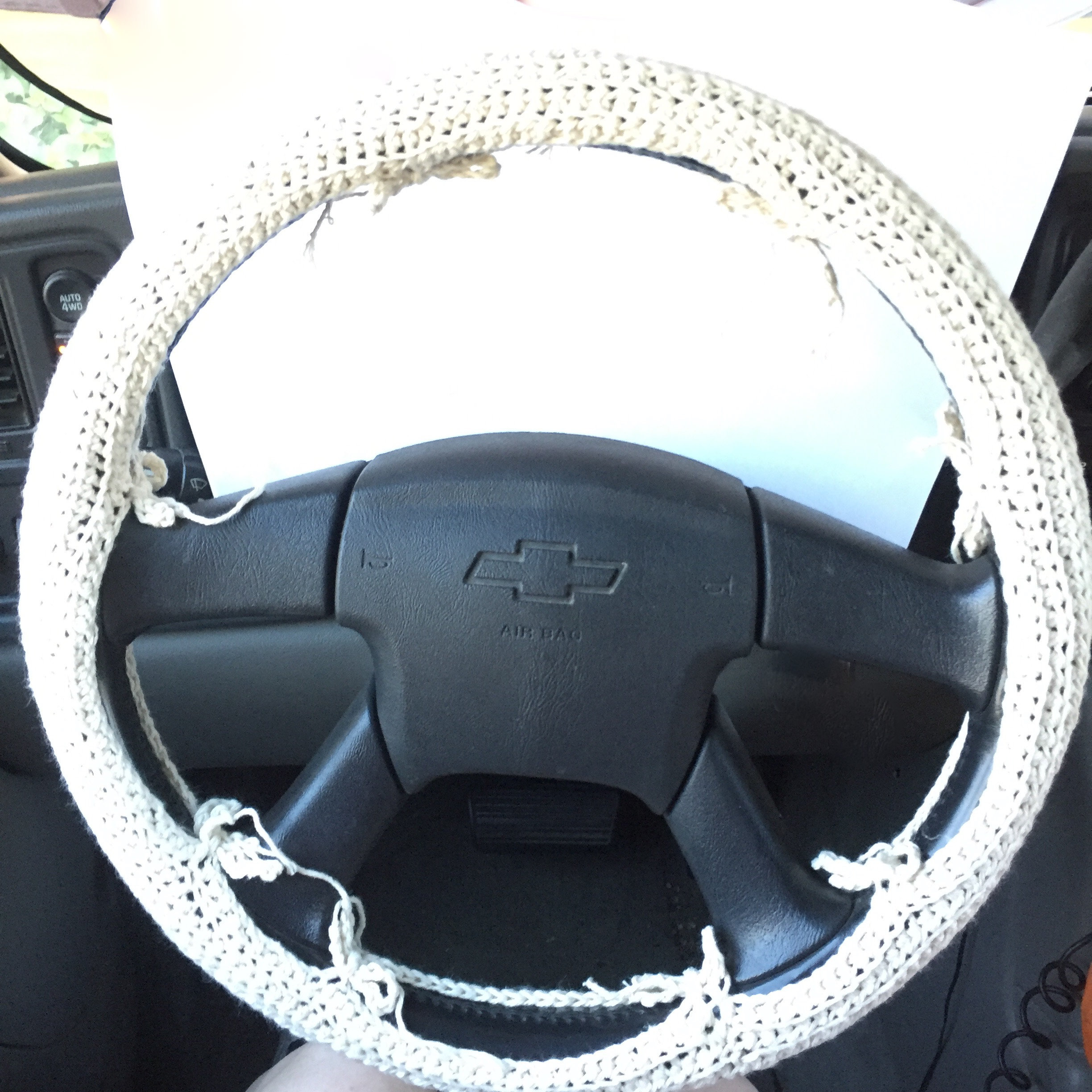 14 Crochet Car Patterns to Stitch Fun Vehicles, Classic Cars, and Cute Amigurumi Designs 7 DIY Crochet Car Steering Wheel Cover