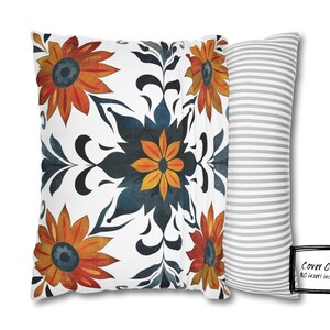 May include: A set of two decorative pillow covers. One cover features a white background with a blue and orange floral pattern. The other cover is gray with white stripes. The text "Cover Only No insert included" is visible in the bottom right corner of the image.