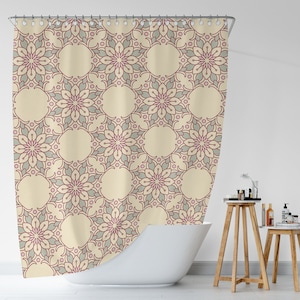 May include: A shower curtain with a cream background and a repeating pattern of pink and gray floral designs.